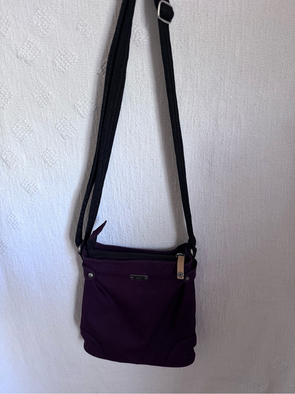 REI Maroon Crossbody Bag with Adjustable Strap and Zip Pockets and Closure